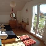 Chambre cosy dans un centre de yoga
