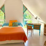Chambre lumineuse et reposante donnant sur le jardin