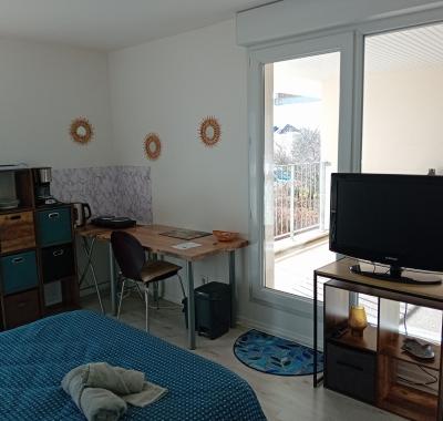 Chambre spacieuse avec balcon couvert