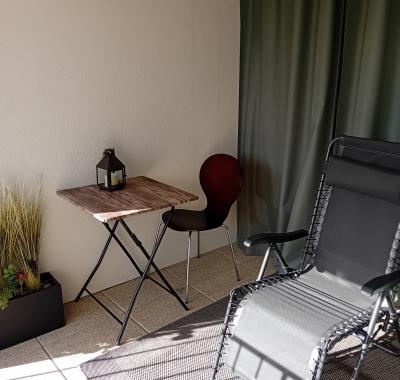 Chambre spacieuse avec balcon couvert