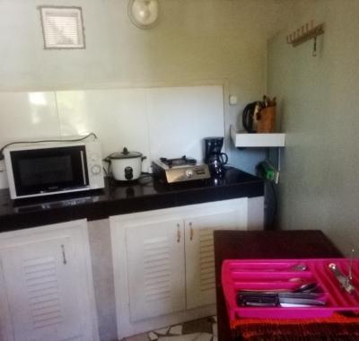 Deux chambres, coin cuisine, jardin à Nosy Be