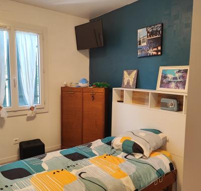 Chambre dans maison climatisée