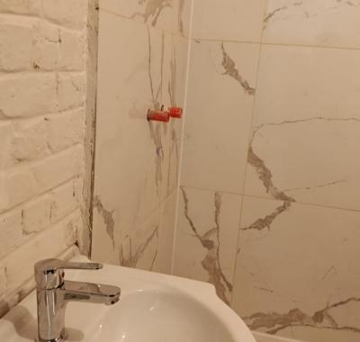 Chambre avec douche et kitchenette